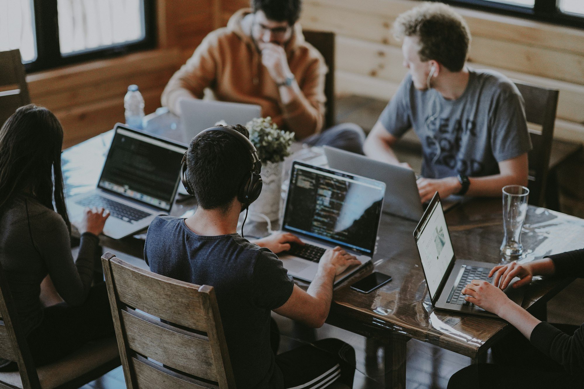 Product engineers collaborating at a bright workspace